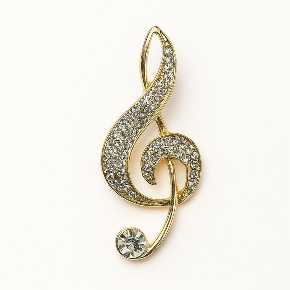 Jewelry - Elegant Gold and Silver Treble Clef Brooch.